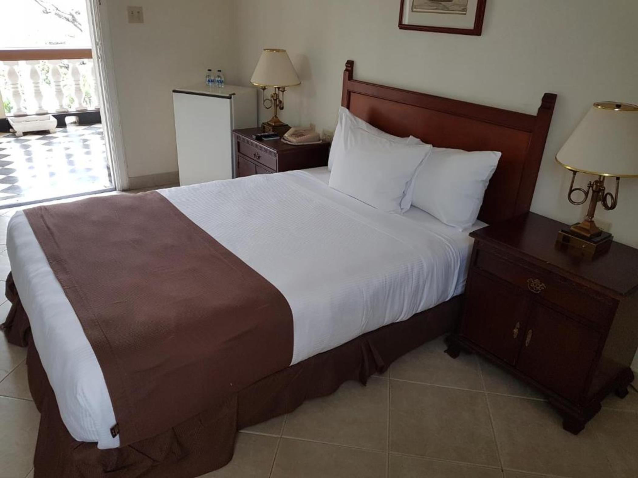 Hotel El Prado Barranquilla  Exterior photo A bed with a bed runner